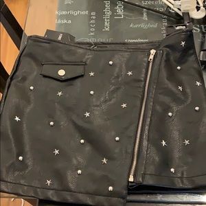 Black studded mini skirt